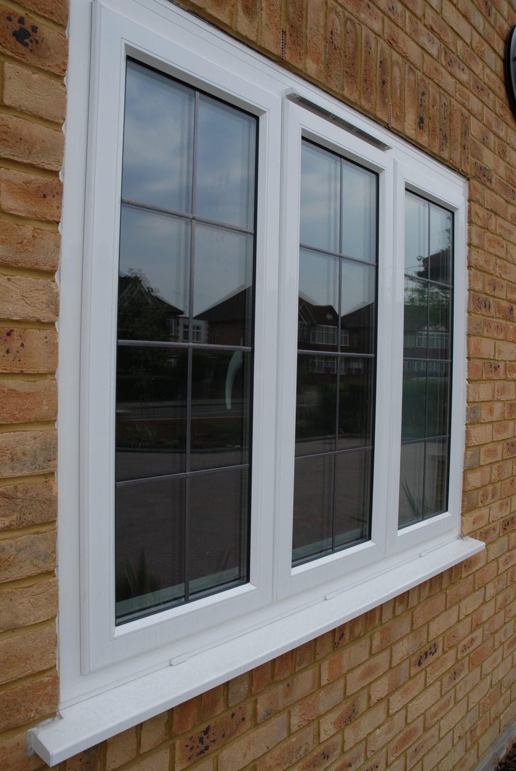 White Aluk Aluminium casement windows
