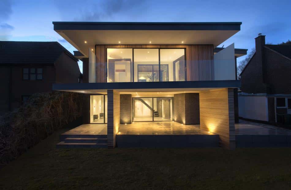 Aluminium sliding doors on a modern home at night