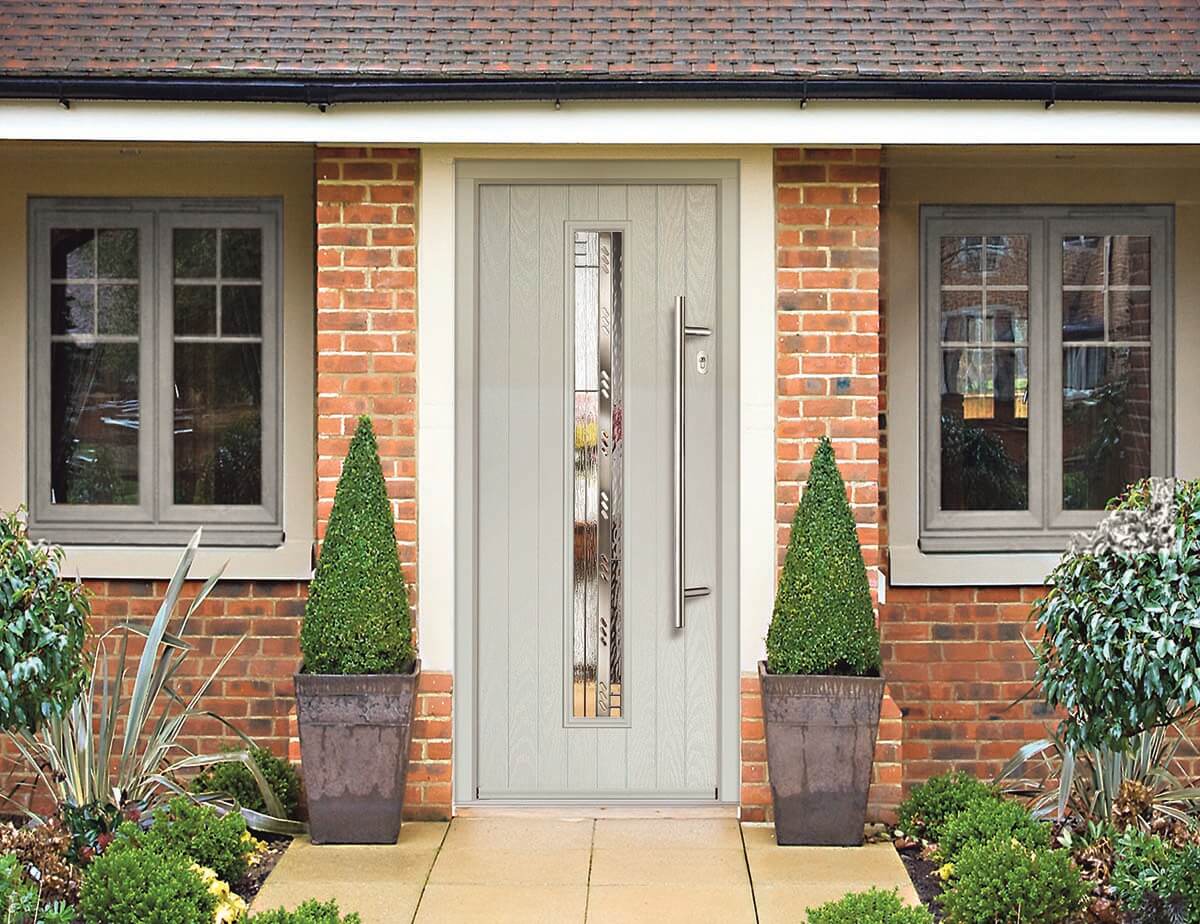 green composite front door with silver bar handle