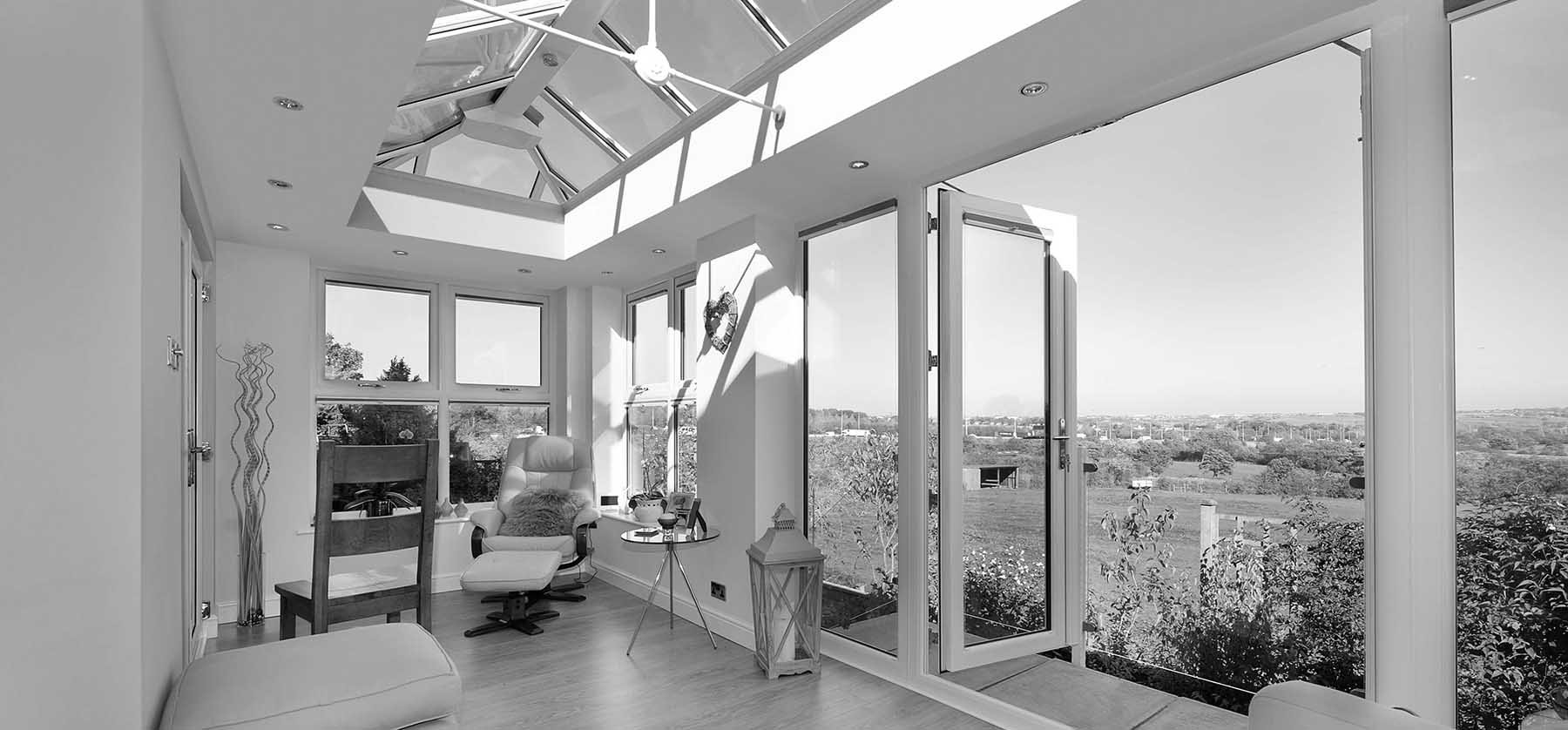 LivinRoom Conservatory Roof System in a conservatory extension with open doors